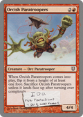 Orcish Paratroopers card from a collectible card game with an orc character and text.