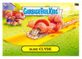 Garbage Pail Kids card featuring Slide Clyde on a yellow slide with green grass background